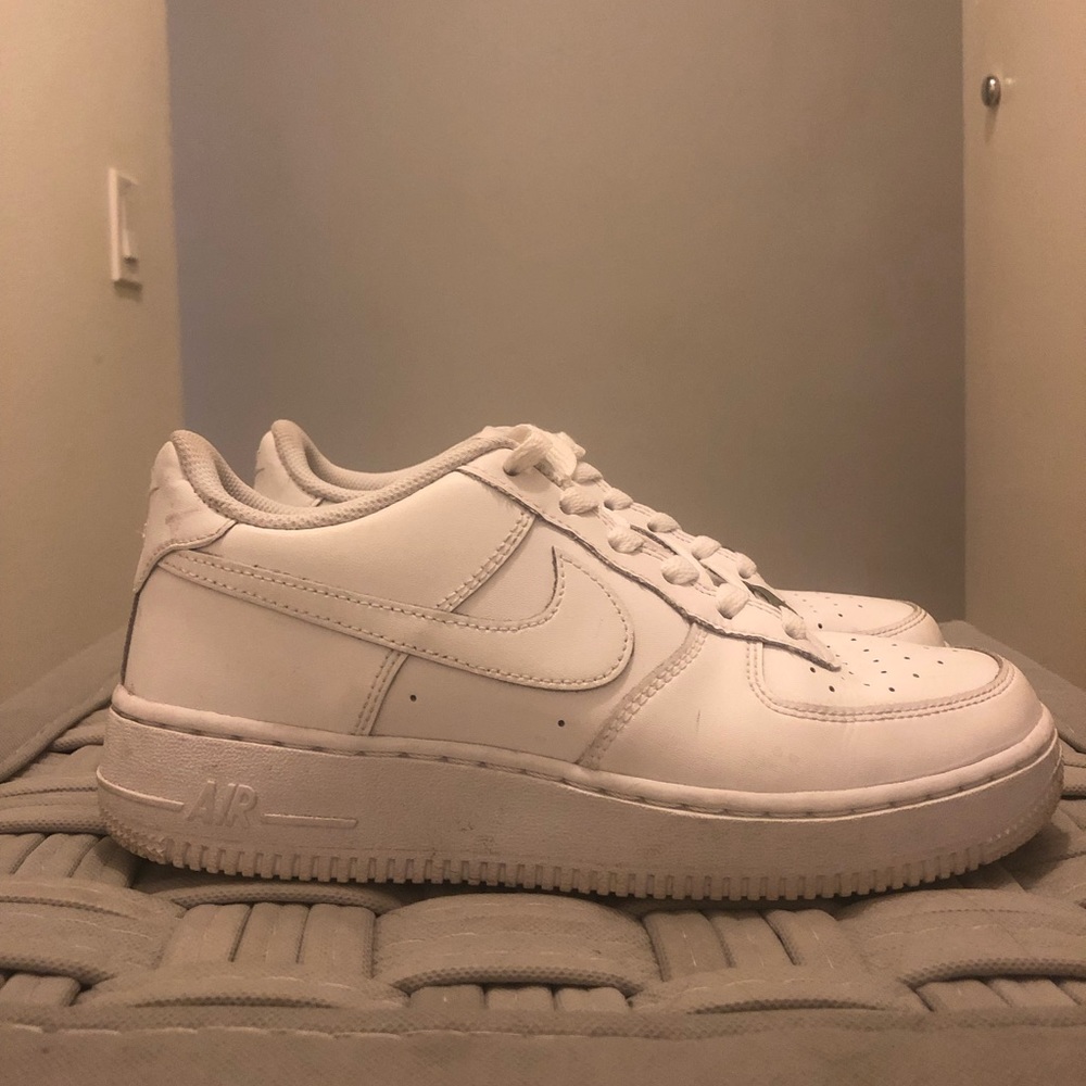 White Nike Air Force 1 low tops